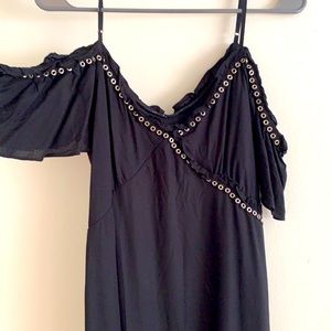 Asymmetrical black shoulder dress with pirate hem